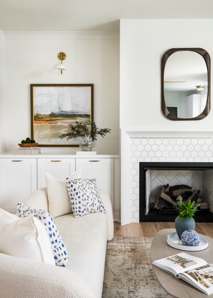 Elegant living room with fireplace and custom millwork in a move-in-ready Charlotte home
